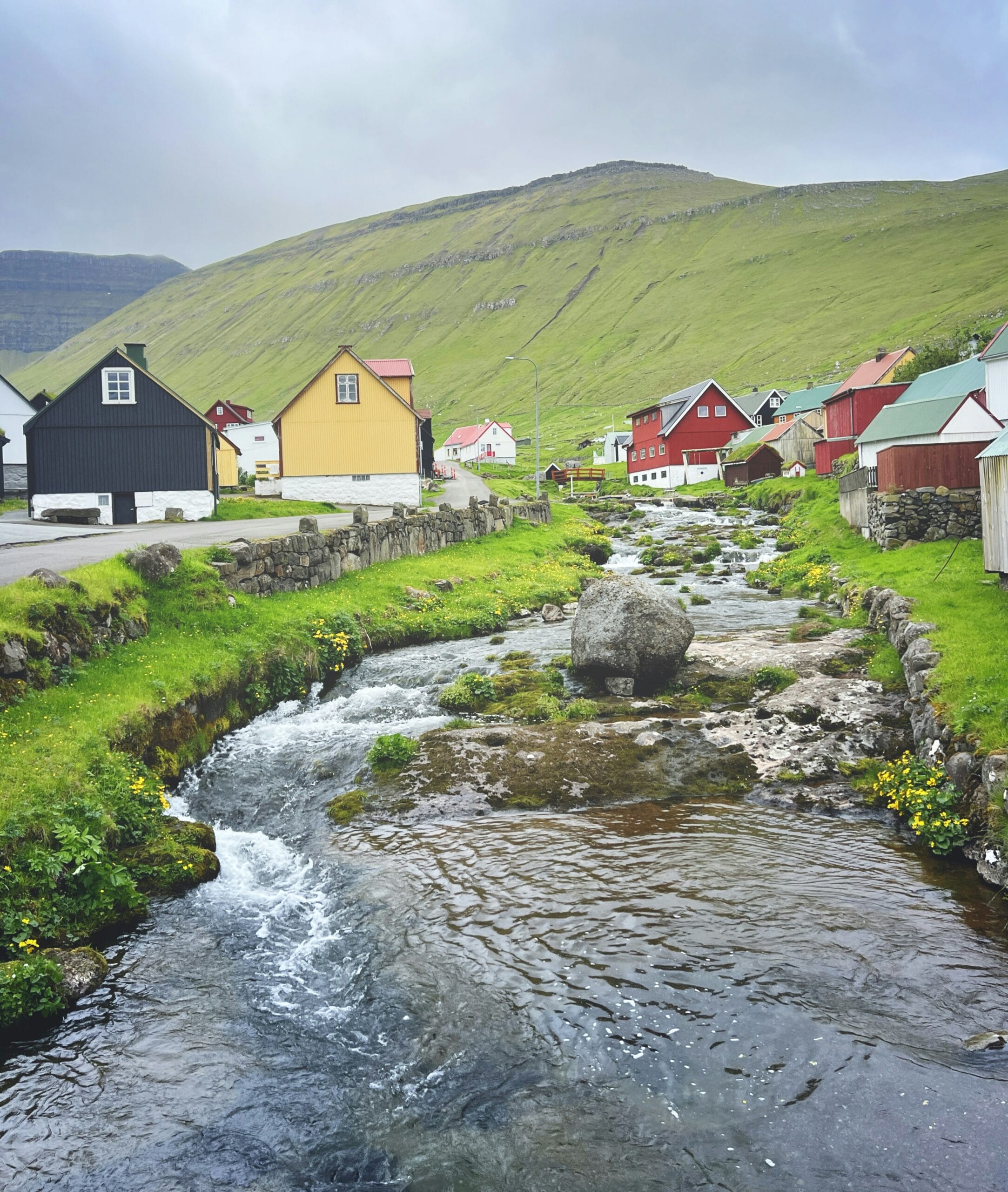 Traditional Faroese coastal landscape where whale hunting traditions continue